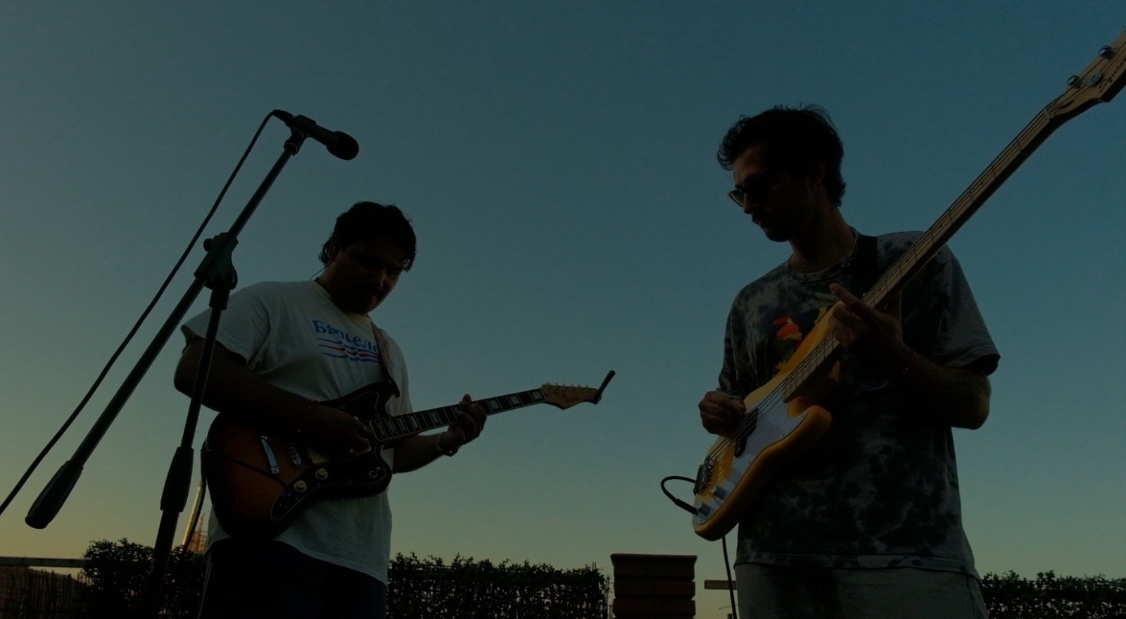 Dissolute Youth playing a rooftop live session in Barcelona at sunset